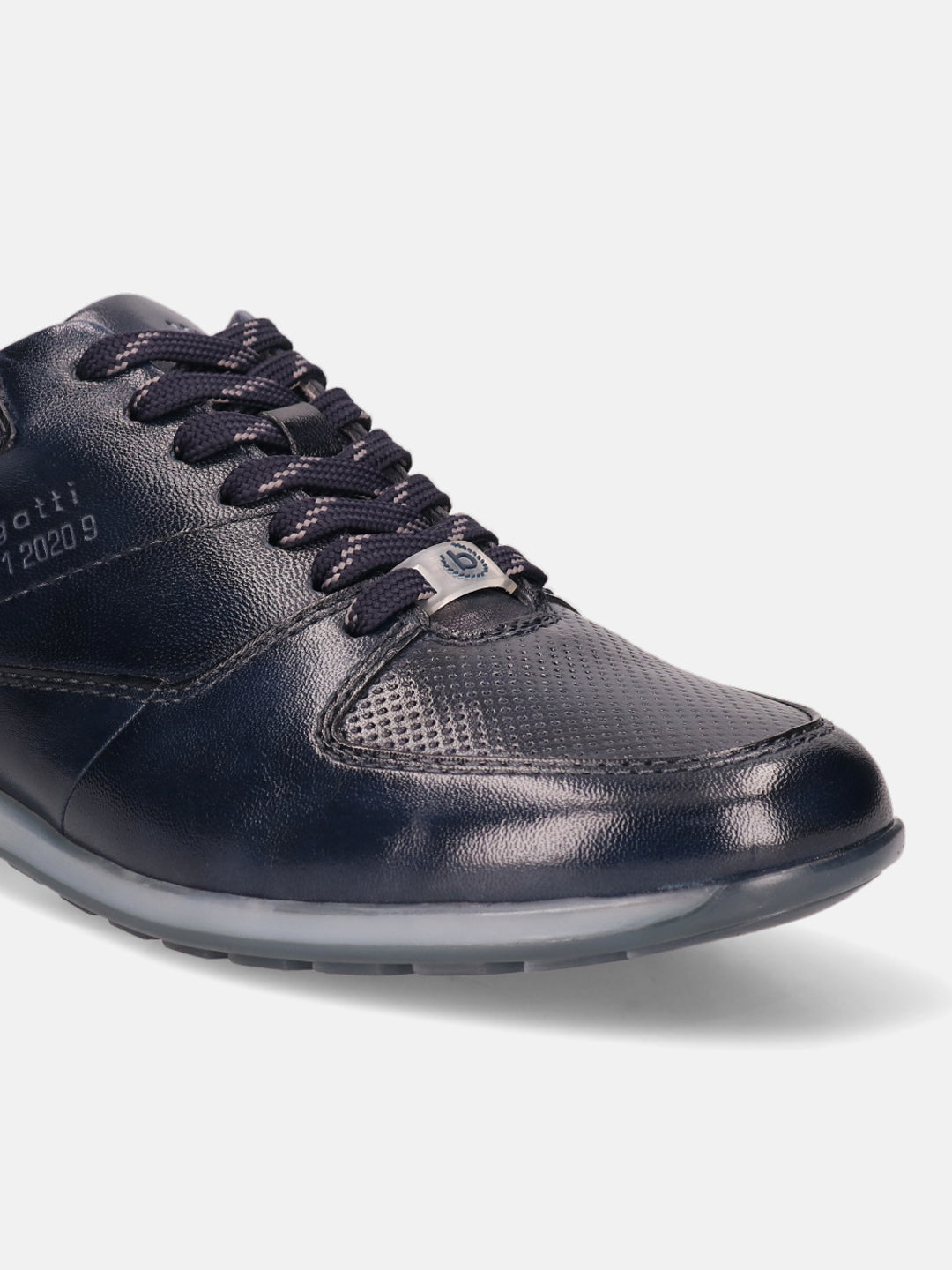 Dark blue leather sneaker by bugatti with patterned laces and perforated leather detail
