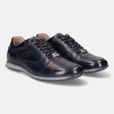 Dark blue leather sneakers by bugatti with dotted texture, matching laces, and light gray soles.