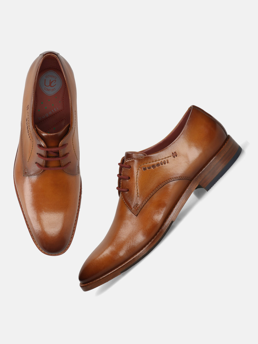 Men's Bugatti derby cognac leather shoes with a pointed toe and plain toe featuring a stacked heel , a leather outsole , and laces fastening.