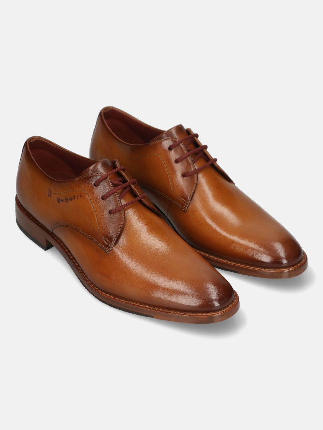 Men's Bugatti derby cognac leather shoes with a pointed toe and plain toe featuring a stacked heel , a leather outsole , and laces fastening.