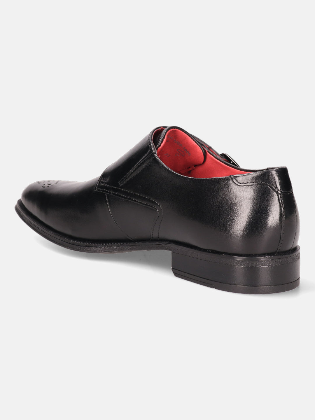 Black leather monk shoe by bugatti, featuring a buckle closure and red interior.