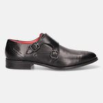 Black leather monk strap shoe by bugatti, with double buckle closure and decorative perforations, shown in a side view.