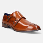 A cognac Men's bugatti Monk Shoe featuring a pointed plain toe, moulded  heel. Made from premium genuine leather with a durable tr outsole, this slip-on design offers both style and comfort.