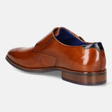 A cognac Men's bugatti Monk Shoe featuring a pointed plain toe, moulded  heel. Made from premium genuine leather with a durable tr outsole, this slip-on design offers both style and comfort.