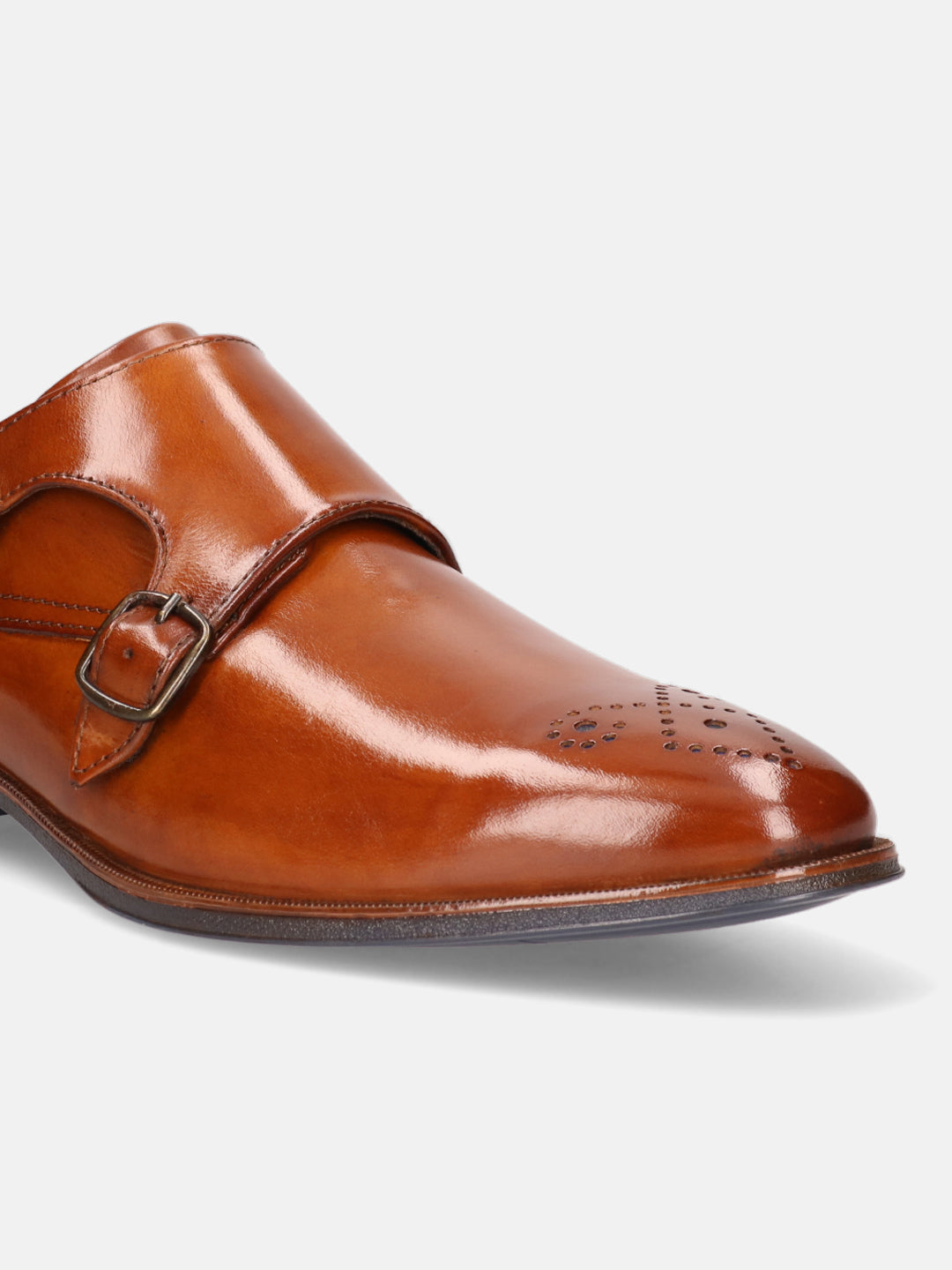 A cognac Men's bugatti Monk Shoe featuring a pointed plain toe, moulded  heel. Made from premium genuine leather with a durable tr outsole, this slip-on design offers both style and comfort.