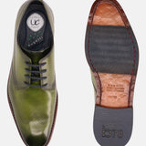 Green leather formal Derby shoes by Bugatti, showing the comfort insole and patterned outsole.