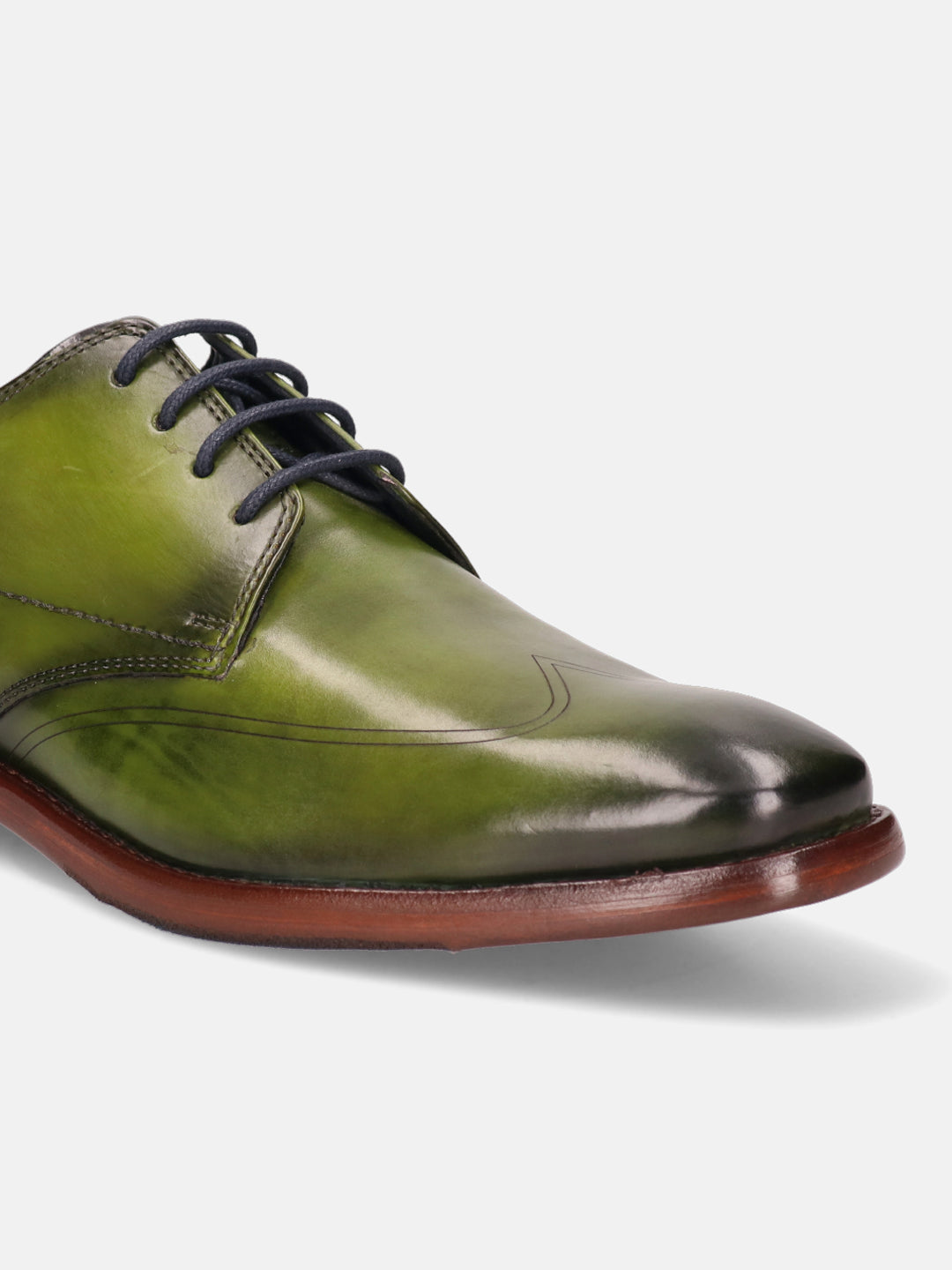 Green leather derby formal shoe by bugatti with dark laces and brown soles.