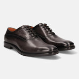 A grey Men's bugatti Oxford featuring a chisel toe plain toe, stacked heel. Made from premium genuine leather with a durable leather outsole, this laces design offers both style and comfort.