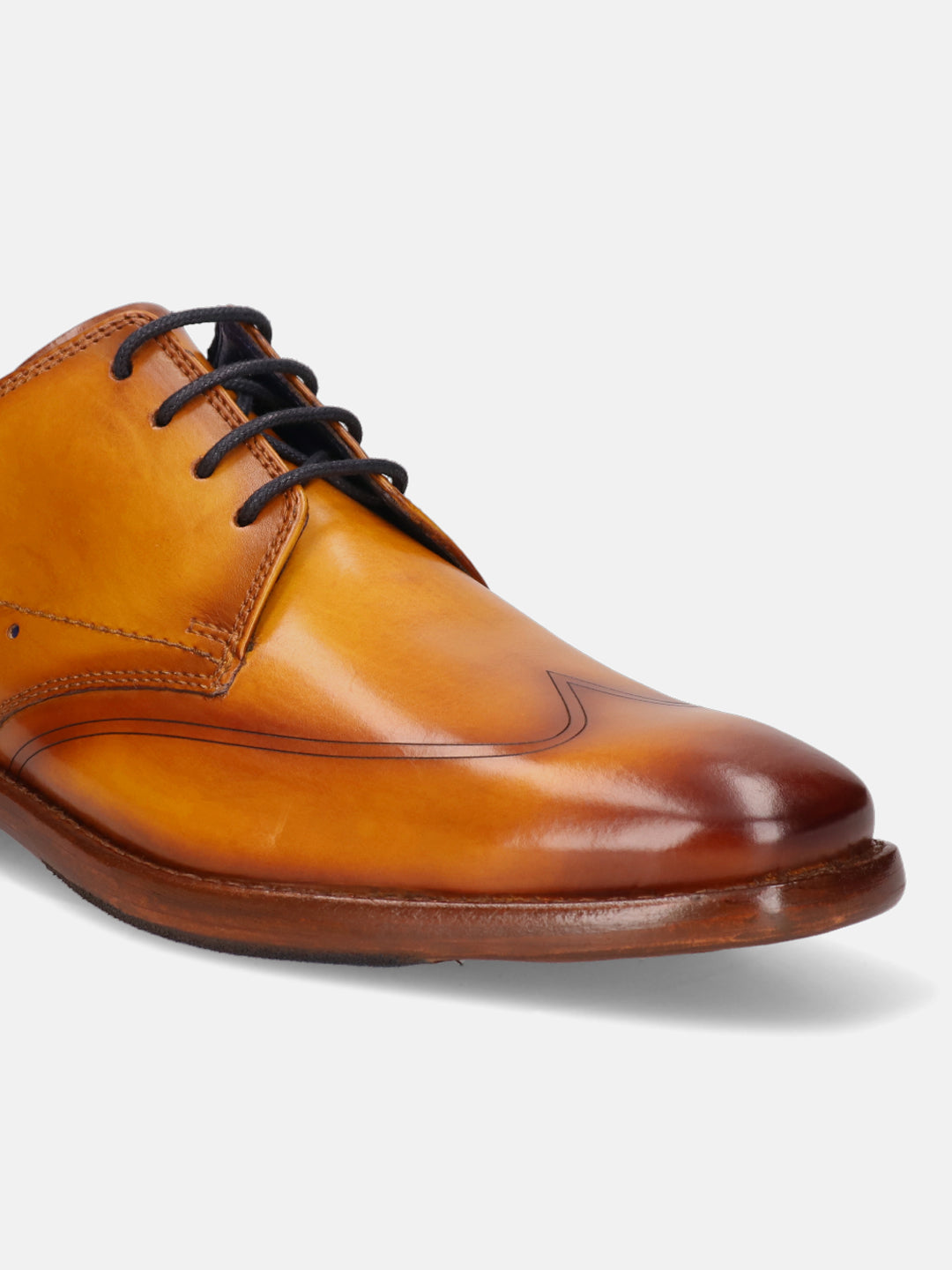 Yellow premium leather derby formal shoe by Bugatti with black laces and tonal stitching.