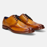 Yellow premium leather derby formal shoes by bugatti with black laces and a brown sole.
