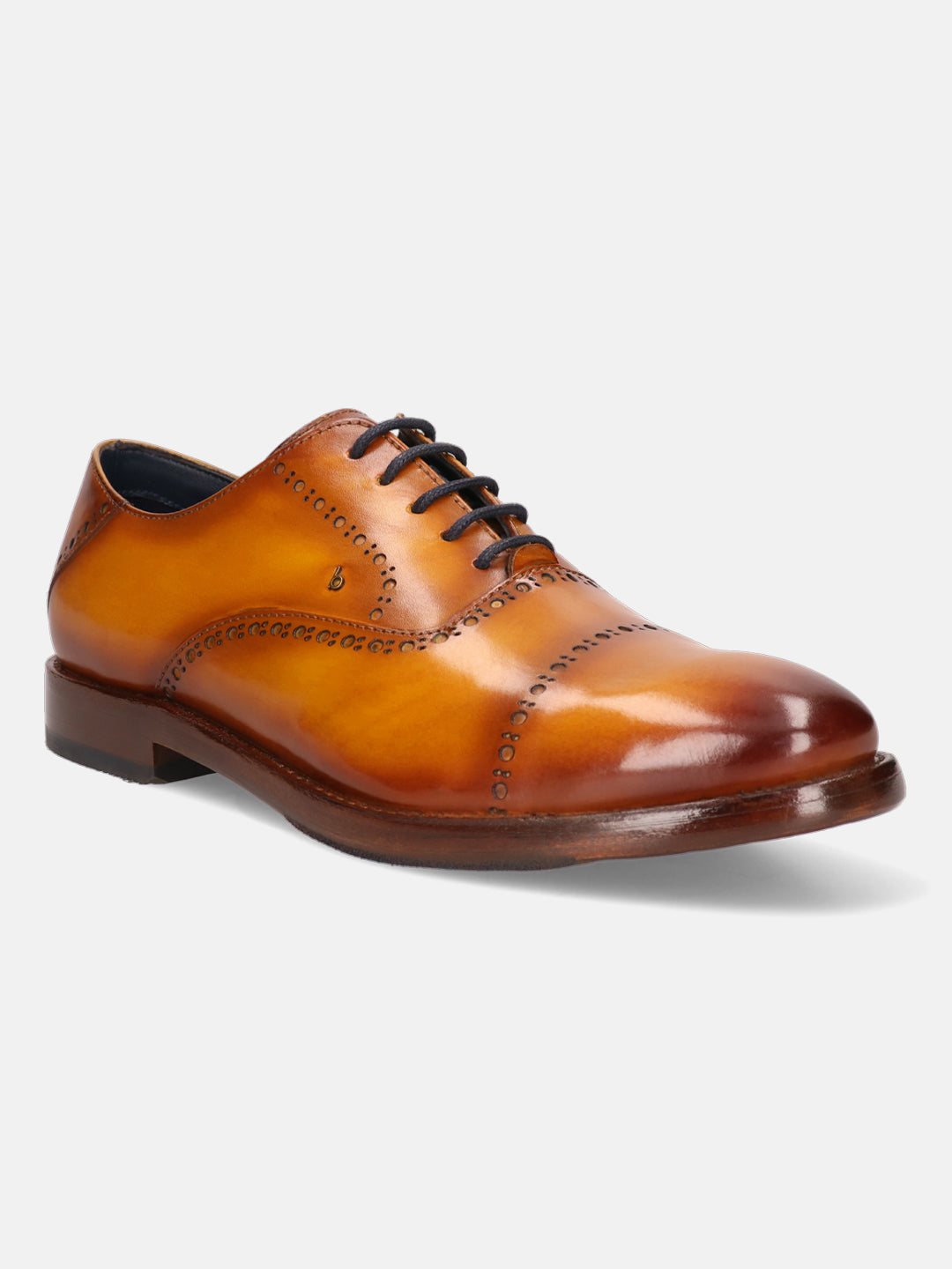 Yellow leather oxford shoes by bugatti, featuring brogue detailing and dark laces.