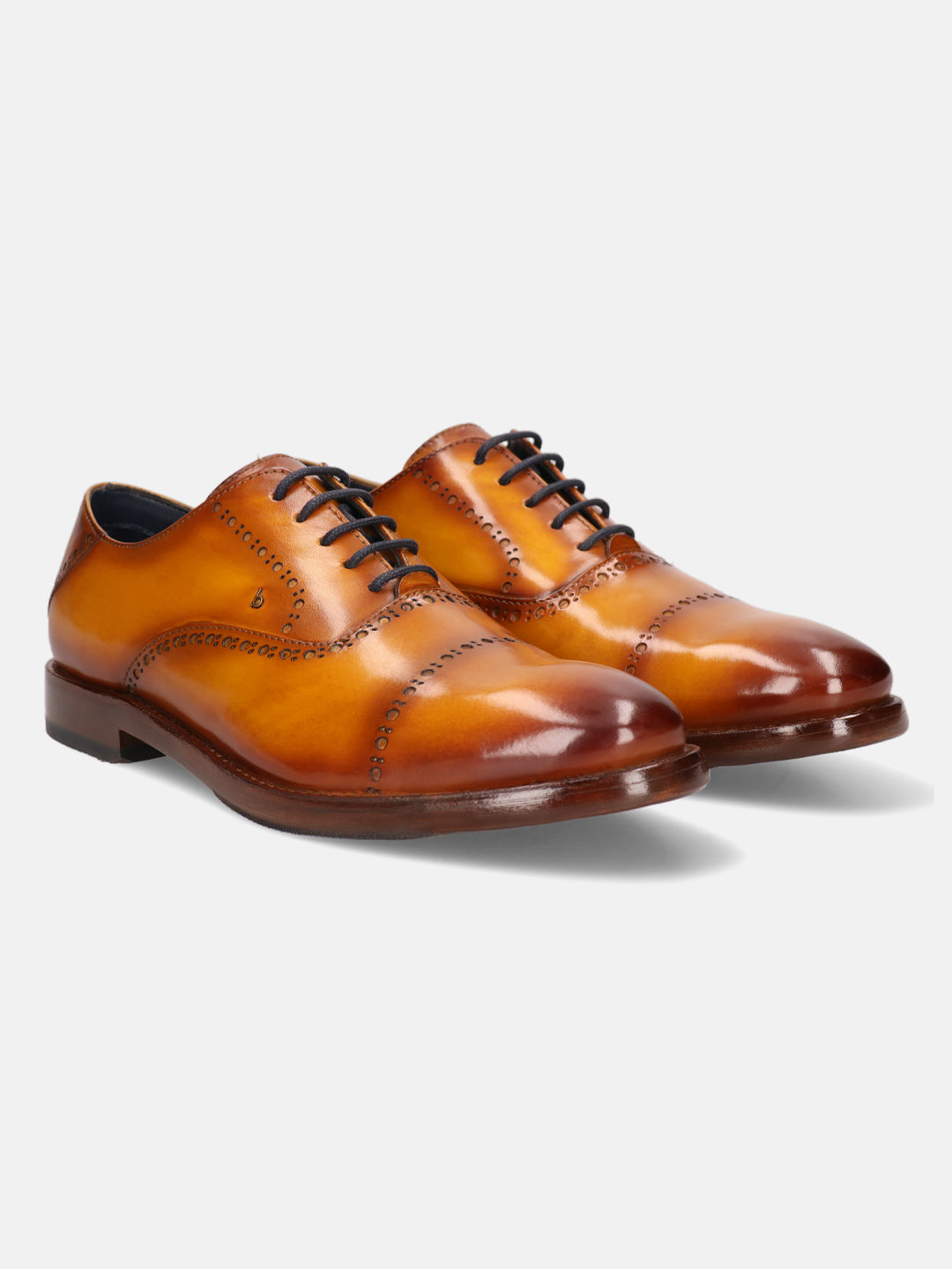 Yellow leather dress shoes by bugatti with black laces, set against a white background.