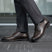 bugatti Laziano Comfort dark grey leather formal shoes worn with grey dress pants.

