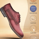 Red premium leather derby shoe by bugatti, featuring a geometric triangle pattern and a stacked heel.