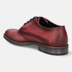 Red leather derby shoe by bugatti, featuring a patterned texture and black laces, shown in a side view.