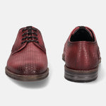 Red premium leather derby formal shoes by bugatti, textured with a subtle geometric pattern.