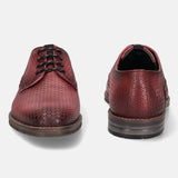 Red premium leather derby formal shoes by bugatti, textured with a subtle geometric pattern.