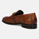 A cognac Men's bugatti Bit Loafer featuring a round apron toe, stacked heel. Made from premium genuine leather with a durable tpr outsole, this slip-on design offers both style and comfort.
