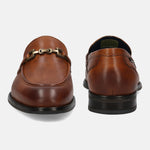 A cognac Men's bugatti Bit Loafer featuring a round apron toe, stacked heel. Made from premium genuine leather with a durable tpr outsole, this slip-on design offers both style and comfort.