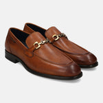 A cognac Men's bugatti Bit Loafer featuring a round apron toe, stacked heel. Made from premium genuine leather with a durable tpr outsole, this slip-on design offers both style and comfort.