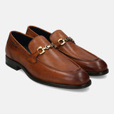 A cognac Men's bugatti Bit Loafer featuring a round apron toe, stacked heel. Made from premium genuine leather with a durable tpr outsole, this slip-on design offers both style and comfort.