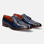 A blue Men's bugatti Tassel Loafers featuring a round toe plain toe, stacked heel. Made from premium genuine leather with a durable leather outsole, this slip-on design offers both style and comfort.