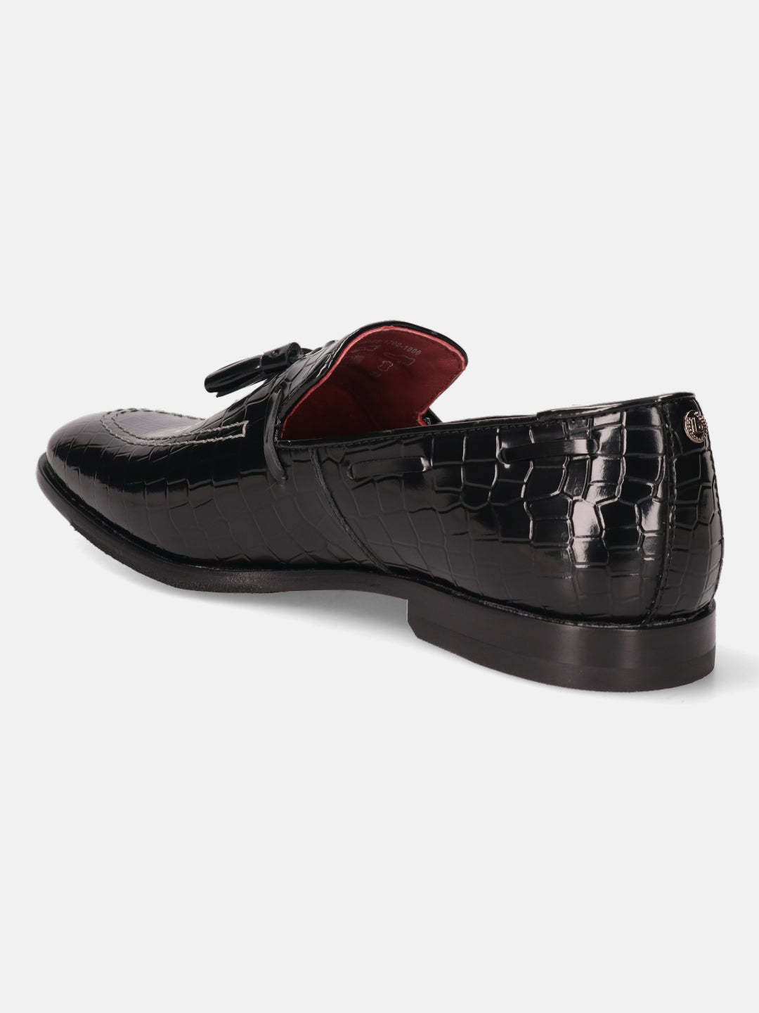 A black Men's bugatti Tassel Loafers featuring a round toe plain toe, stacked heel. Made from premium genuine leather with a durable leather outsole, this slip-on design offers both style and comfort.