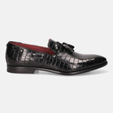 A black Men's bugatti Tassel Loafers featuring a round toe plain toe, stacked heel. Made from premium genuine leather with a durable leather outsole, this slip-on design offers both style and comfort.