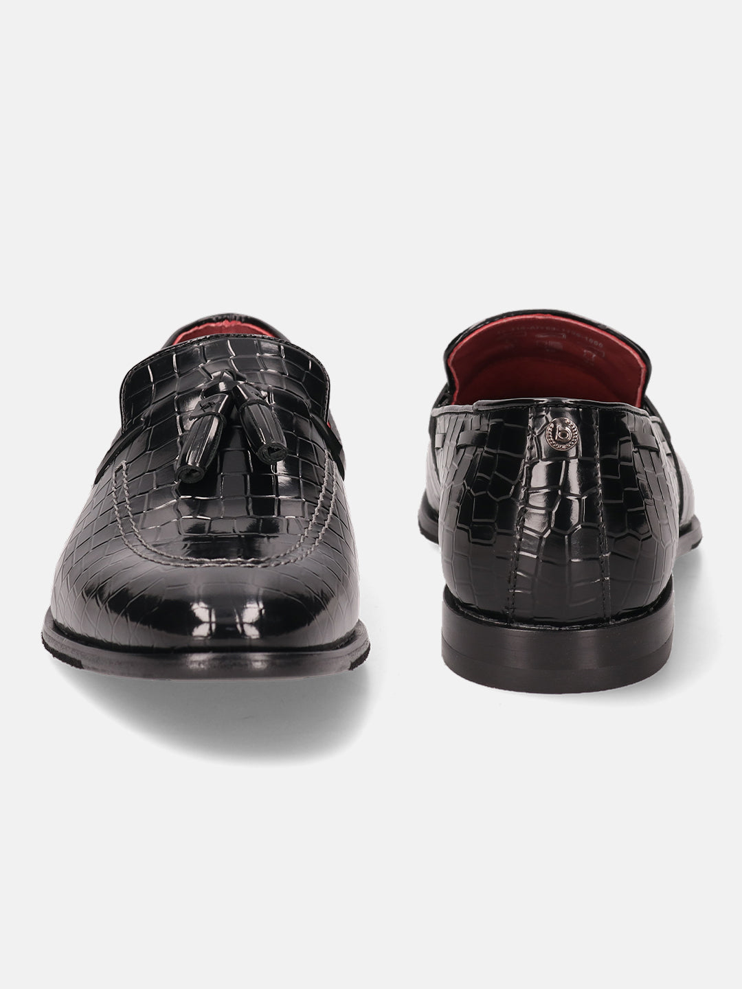 A black Men's bugatti Tassel Loafers featuring a round toe plain toe, stacked heel. Made from premium genuine leather with a durable leather outsole, this slip-on design offers both style and comfort.
