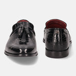 A black Men's bugatti Tassel Loafers featuring a round toe plain toe, stacked heel. Made from premium genuine leather with a durable leather outsole, this slip-on design offers both style and comfort.