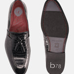 A black Men's bugatti Tassel Loafers featuring a round toe plain toe, stacked heel. Made from premium genuine leather with a durable leather outsole, this slip-on design offers both style and comfort.