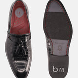 A black Men's bugatti Tassel Loafers featuring a round toe plain toe, stacked heel. Made from premium genuine leather with a durable leather outsole, this slip-on design offers both style and comfort.