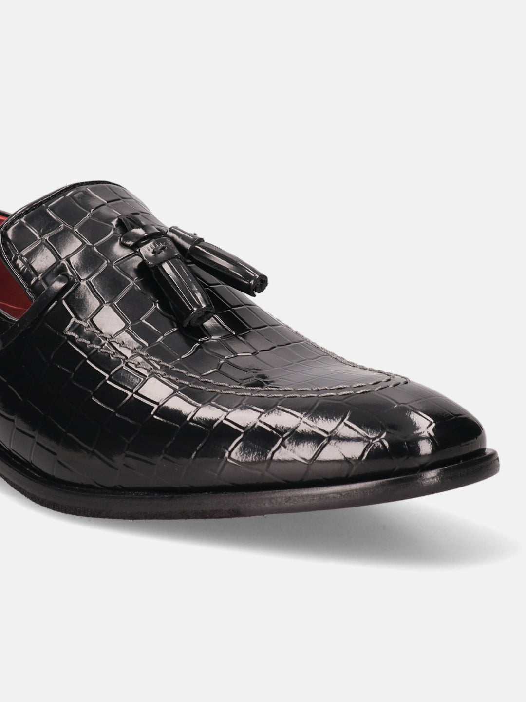A black Men's bugatti Tassel Loafers featuring a round toe plain toe, stacked heel. Made from premium genuine leather with a durable leather outsole, this slip-on design offers both style and comfort.