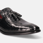 A black Men's bugatti Tassel Loafers featuring a round toe plain toe, stacked heel. Made from premium genuine leather with a durable leather outsole, this slip-on design offers both style and comfort.