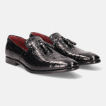 A black Men's bugatti Tassel Loafers featuring a round toe plain toe, stacked heel. Made from premium genuine leather with a durable leather outsole, this slip-on design offers both style and comfort.