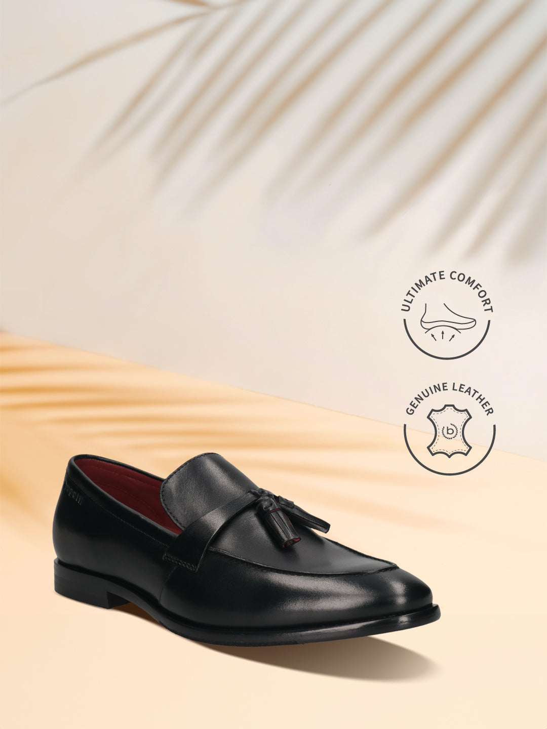 Bugatti Rico black leather slip-on dress shoe with tassel detail and a comfortable, genuine leather construction.
