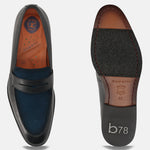 Black leather loafers by bugatti, featuring a suede vamp and rubber sole.