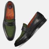 Black leather comfort penny loafers by bugatti, with green suede vamp and the brand logo on the side.