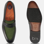 Black leather loafer by bugatti, featuring a dark green suede vamp and a comfortable sole.
