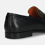 Black leather penny loafer by bugatti, showing the heel and green and orange lining.