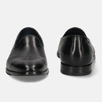 A black Men's bugatti Venetian Loafers featuring a round toe plain toe, stacked heel. Made from premium genuine leather with a durable leather outsole, this slip-on design offers both style and comfort.