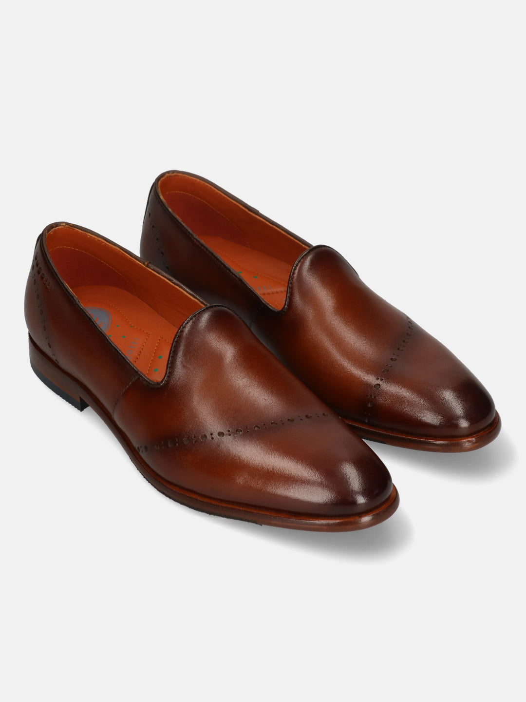 A cognac Men's bugatti Venetian Loafers featuring a round toe plain toe, stacked heel. Made from premium genuine leather with a durable leather outsole, this slip-on design offers both style and comfort.