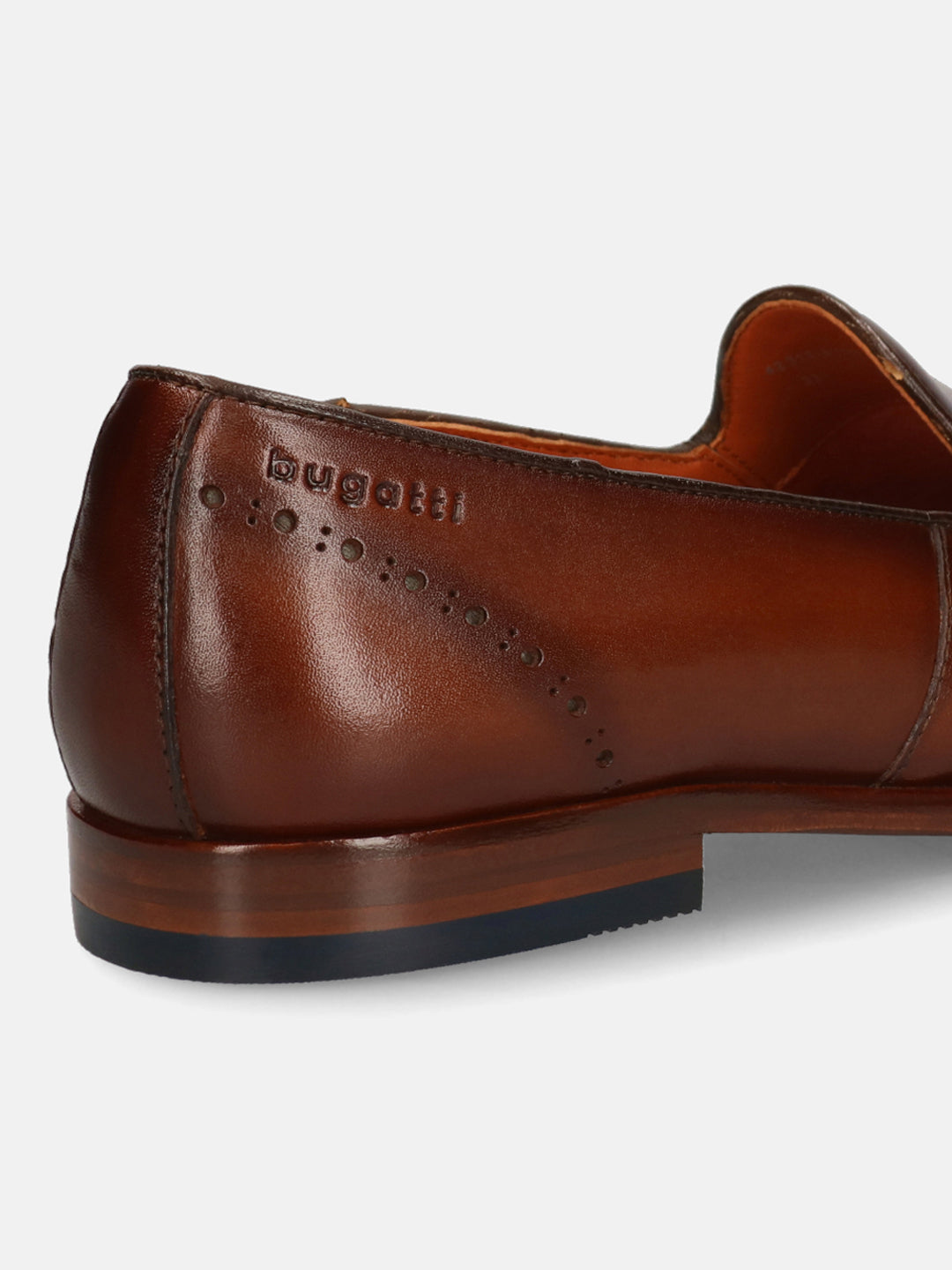 A cognac Men's bugatti Venetian Loafers featuring a round toe plain toe, stacked heel. Made from premium genuine leather with a durable leather outsole, this slip-on design offers both style and comfort.