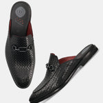 A black Men's bugatti Mules featuring a round toe apron toe, stacked heel. Made from premium genuine leather with a durable leather outsole, this slip-on design offers both style and comfort.