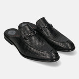 A black Men's bugatti Mules featuring a round toe apron toe, stacked heel. Made from premium genuine leather with a durable leather outsole, this slip-on design offers both style and comfort.