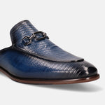Blue leather slip-on shoe by bugatti, featuring a reptile scale texture and decorative metal chain.