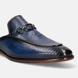 Blue leather slip-on shoe by bugatti, featuring a reptile scale texture and decorative metal chain.