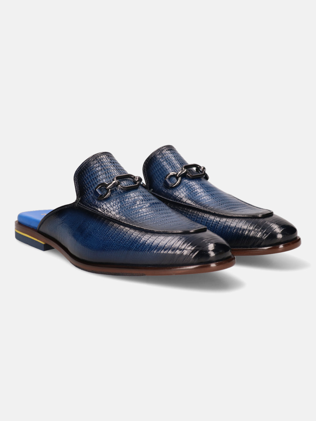 Blue leather slip-on shoe by Bugatti, with a reptile skin pattern and metal chain detail.