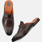 Brown leather slip-on shoe by bugatti with a woven texture and bronze-toned hardware detail.