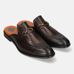 Brown leather slip-on shoes by bugatti with woven texture and decorative chain detail.